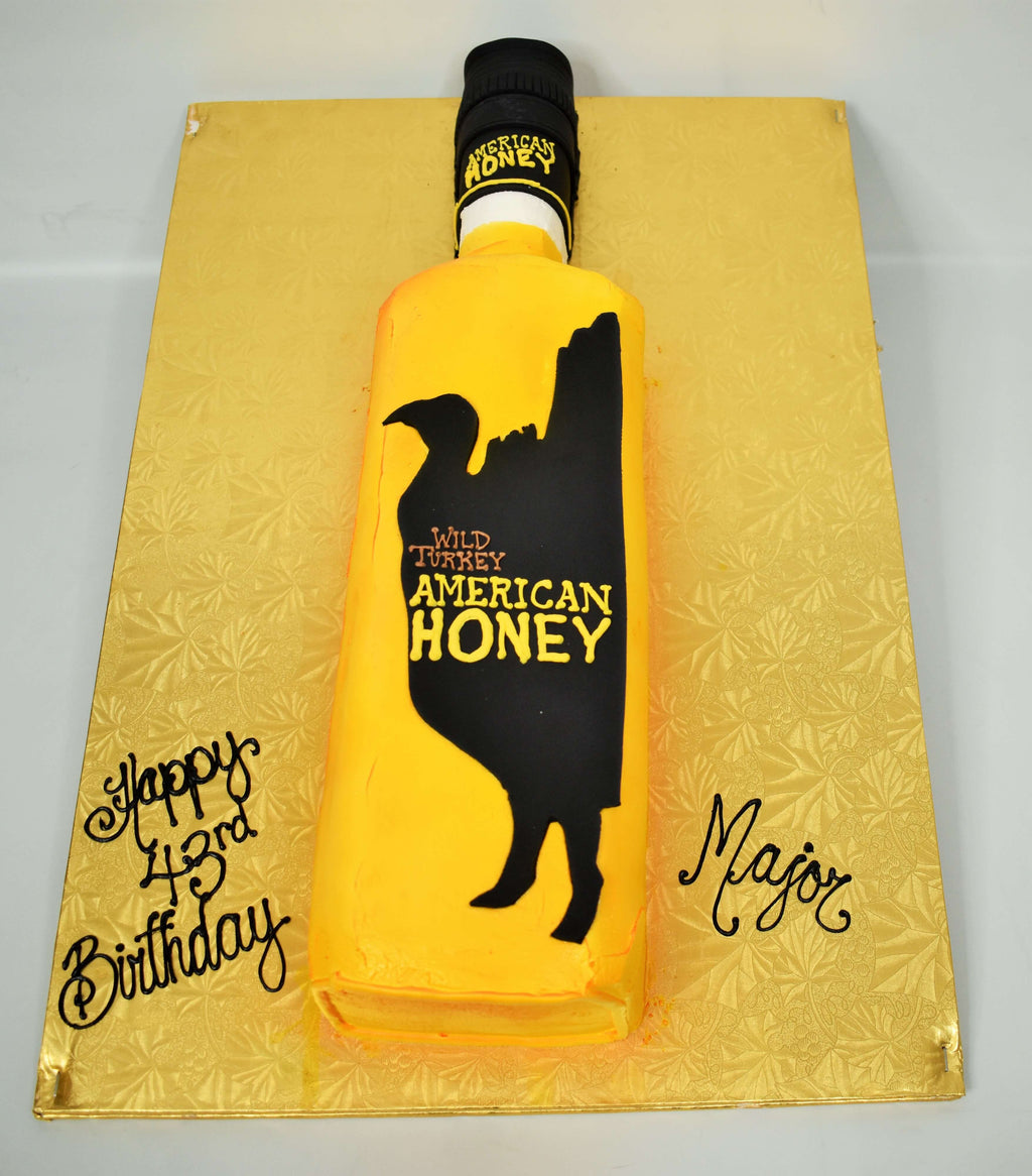 McArthur's Bakery Custom Cake with a American Honey Liquor Bottle Cut Out