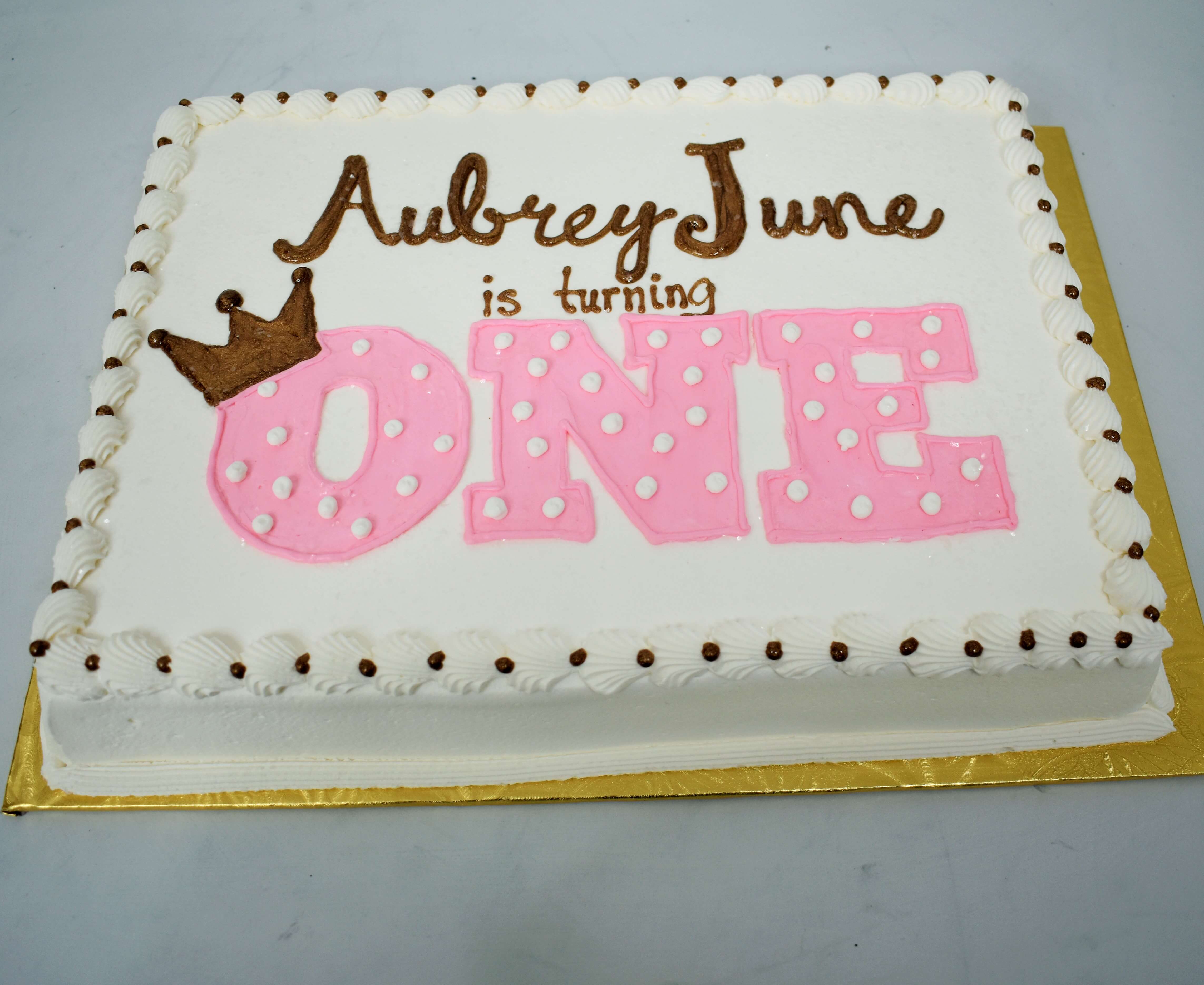 MaArthur's Bakery Custom Cake With Large One in Pink with Polka Dots and Gold Crown