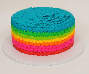 MaArthur's Bakery Custom Cake With Rainbow Ruffles.