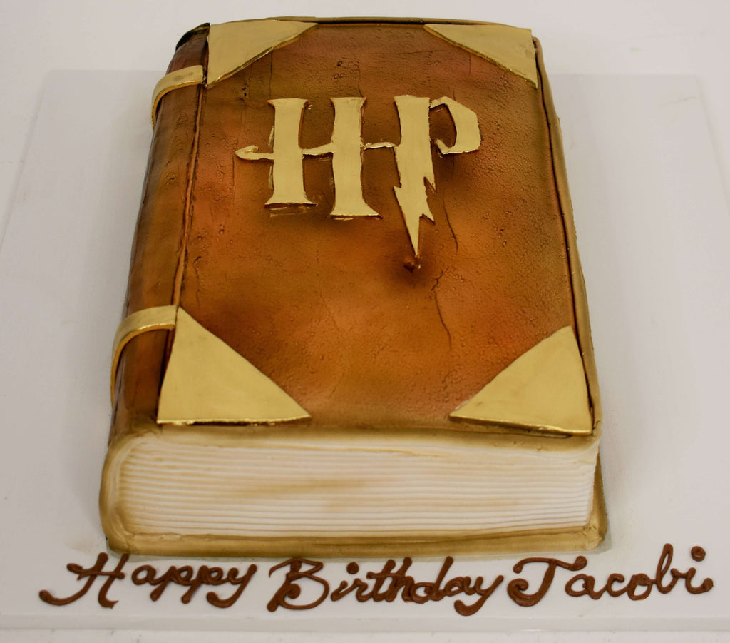 McArthur's Bakery Custom Cake with a Harry Potter Book Cut Out