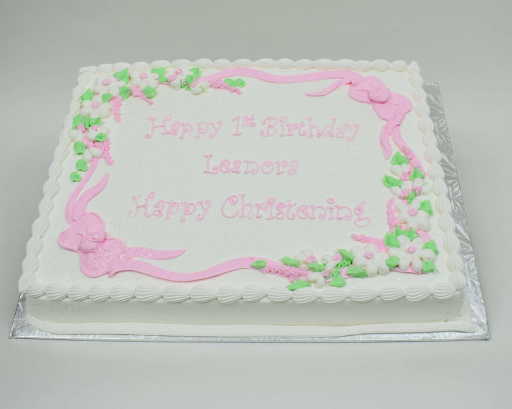MaArthur's Bakery Custom Cake With Pink Bows, Flowers, White, Pink.