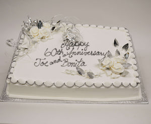 MaArthur's Bakery Custom Cake Silver Leaves, Sliver Ribbon, White Roses