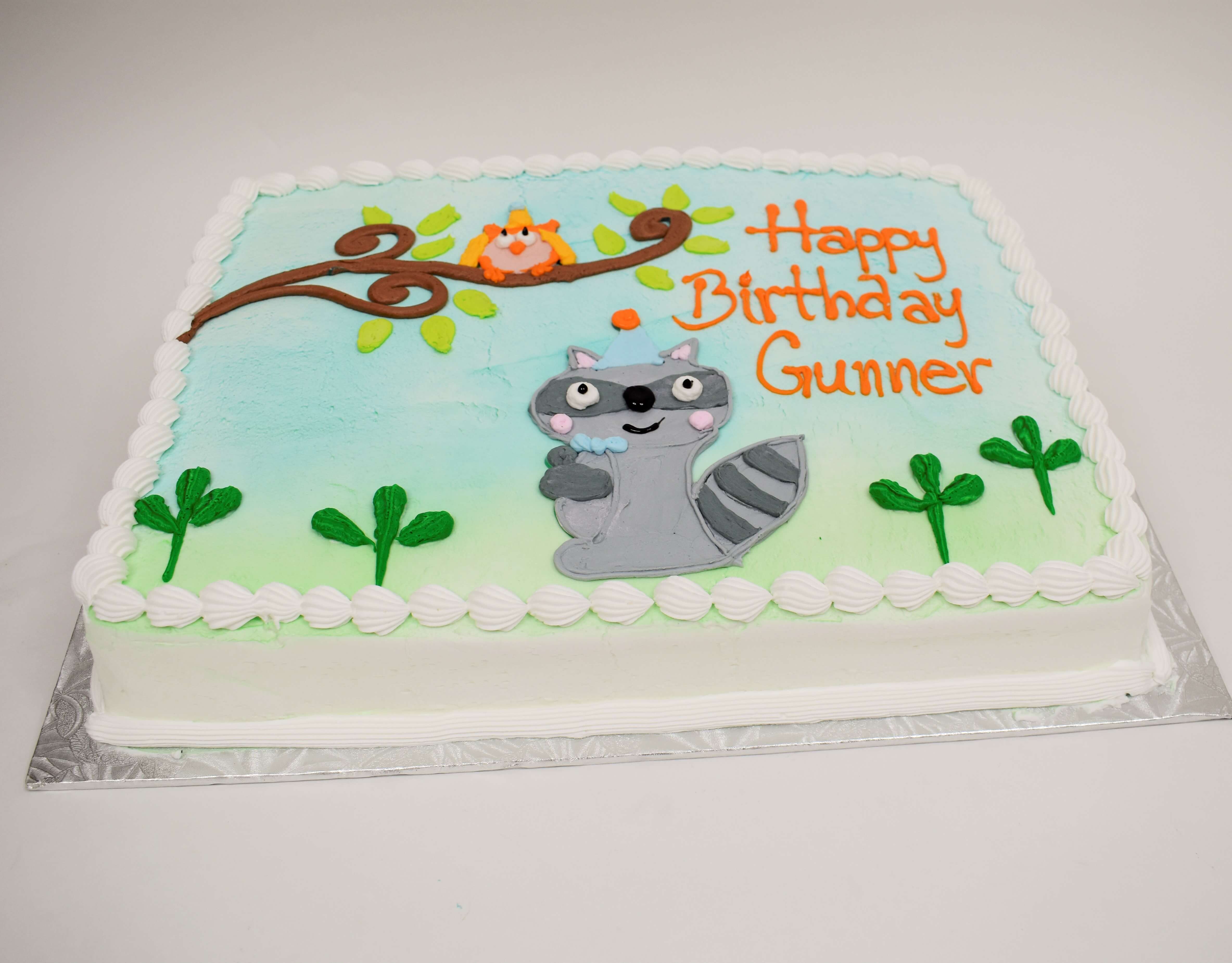 McArthur's Bakery Custom Cake with Racoon, Owl Sitting on a branch 