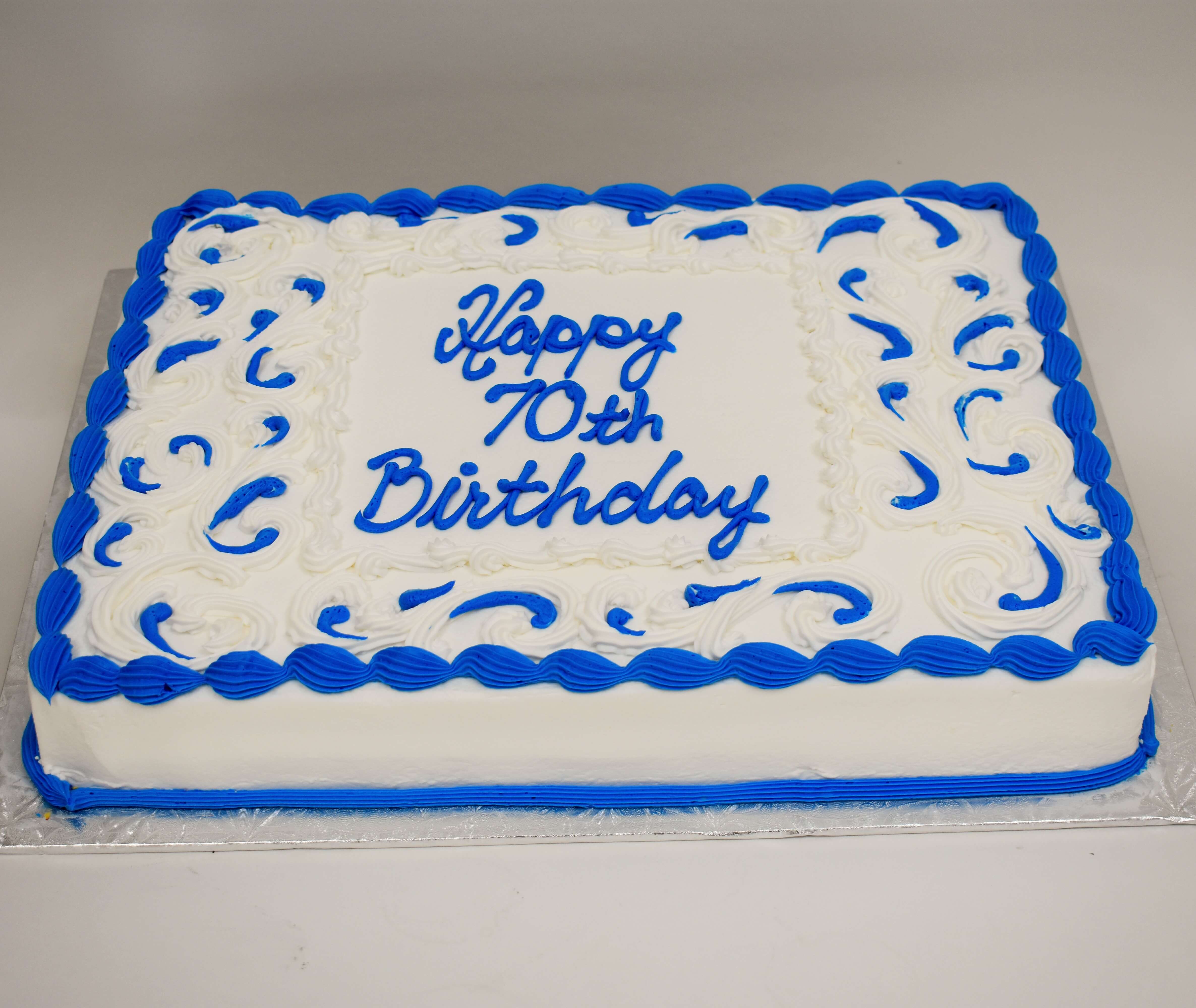 MaArthur's Bakery Custom Cake with Blue and White Icing Scrolling