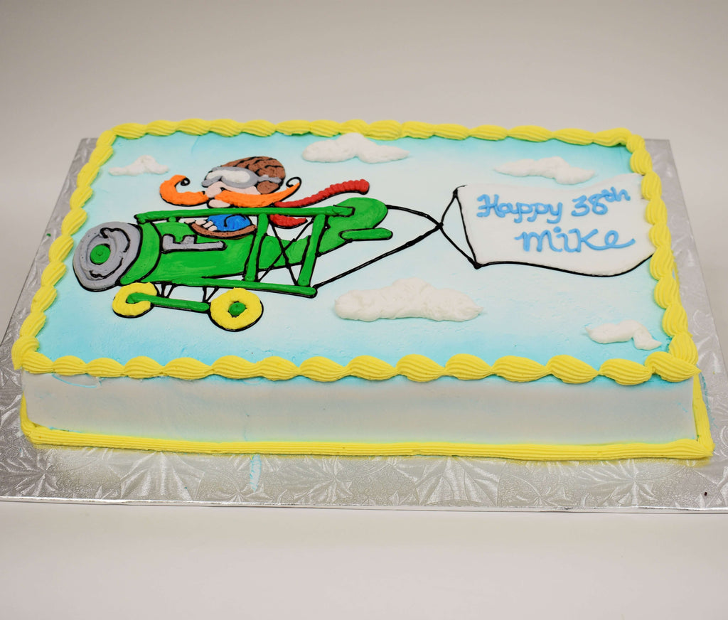MaArthur's Bakery Custom Cake with Plane, Pilot, Banner, Clouds
