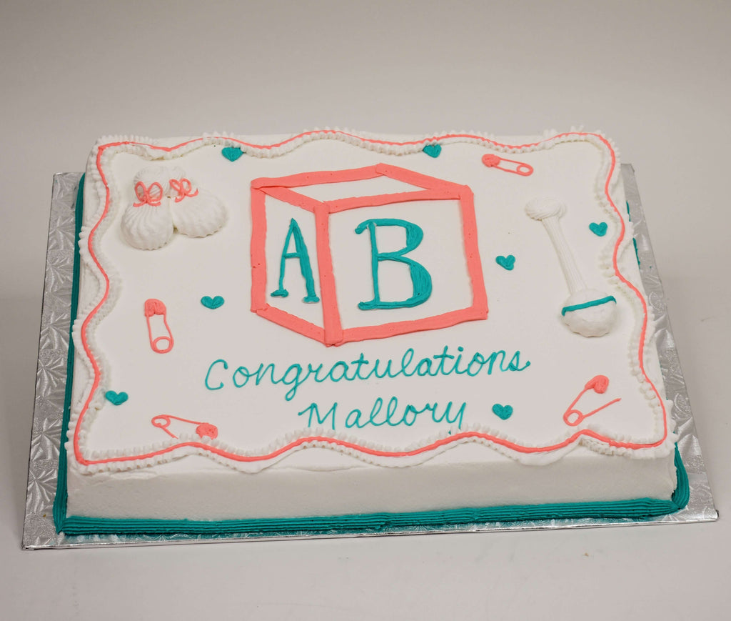 MaArthur's Bakery Custom Cake with Baby Blocks, Booties, Rattle, and Baby Pins