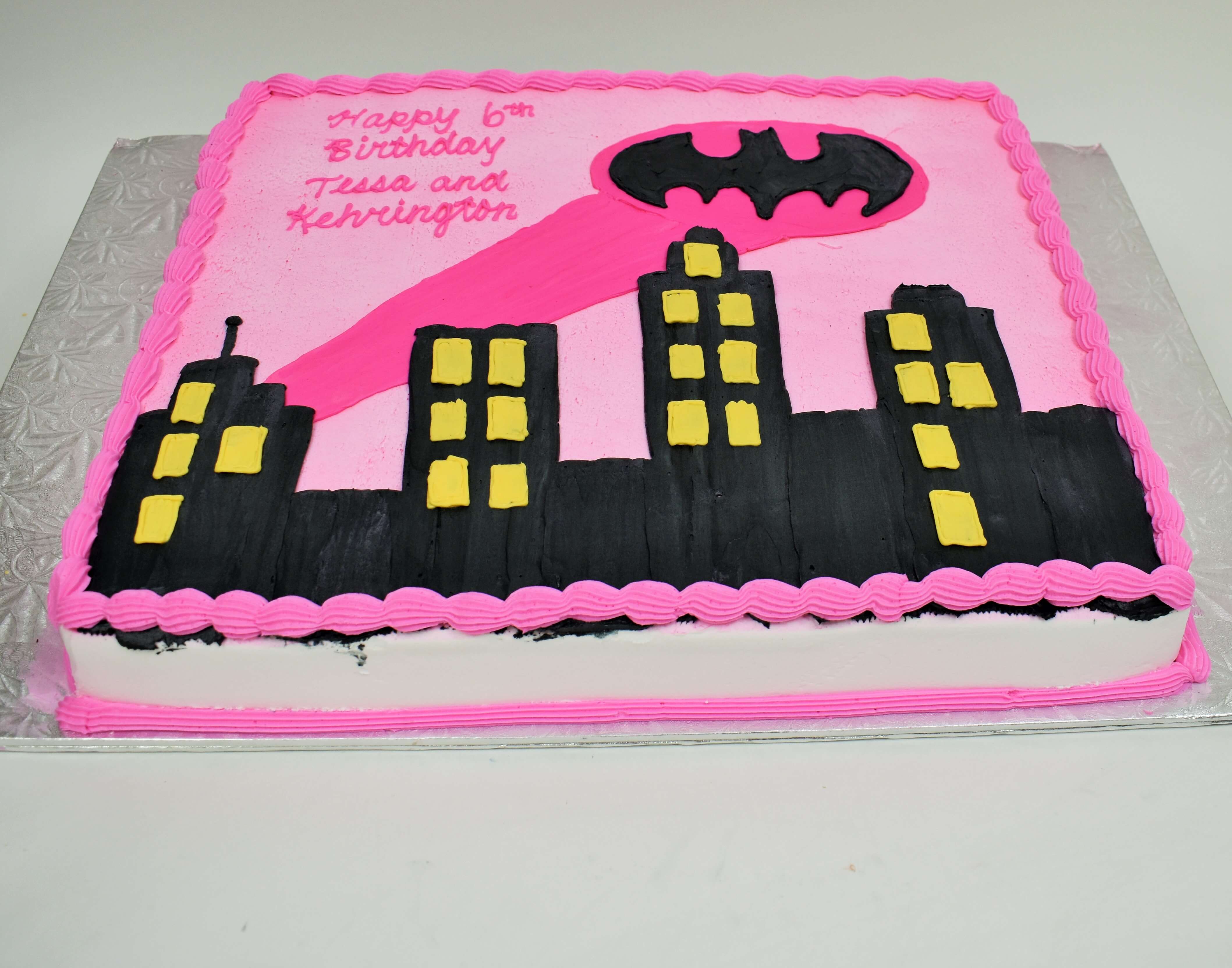 MaArthur's Bakery Custom Cake with Bat Girl, City Scene, Pink, Bat Logo