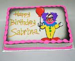 McArthur's Bakery Custom Cake with Scary Clown, Holding a Balloon, Purple Hair, Yellow Outfit.
