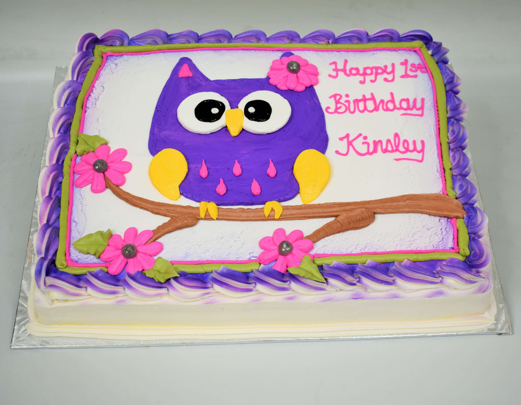 MaArthur's Bakery Custom Cake with a Purplr Owl, Branch, Pink Flowers