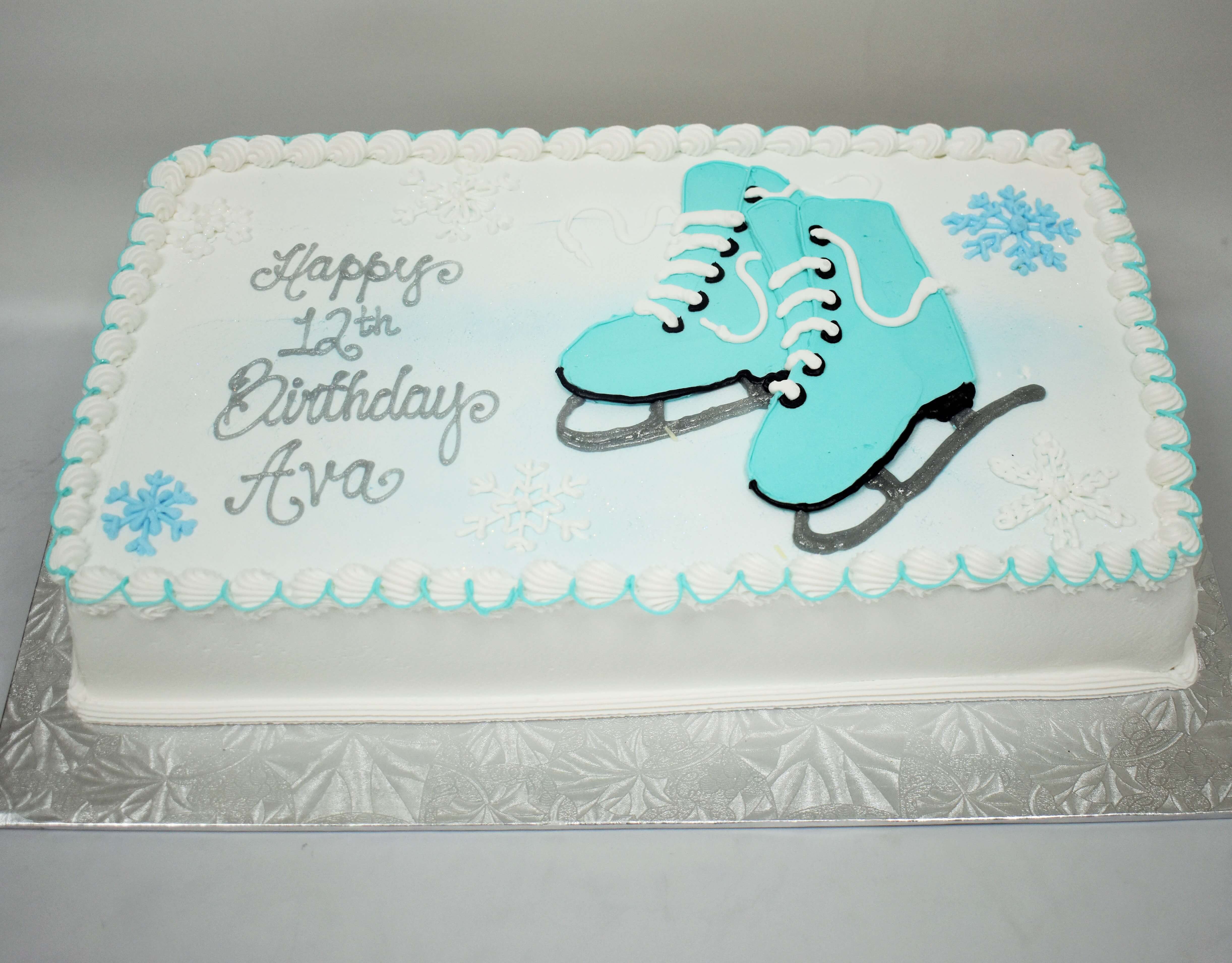 MaArthur's Bakery Custom Cake with Ice Skates and Snow Flakes