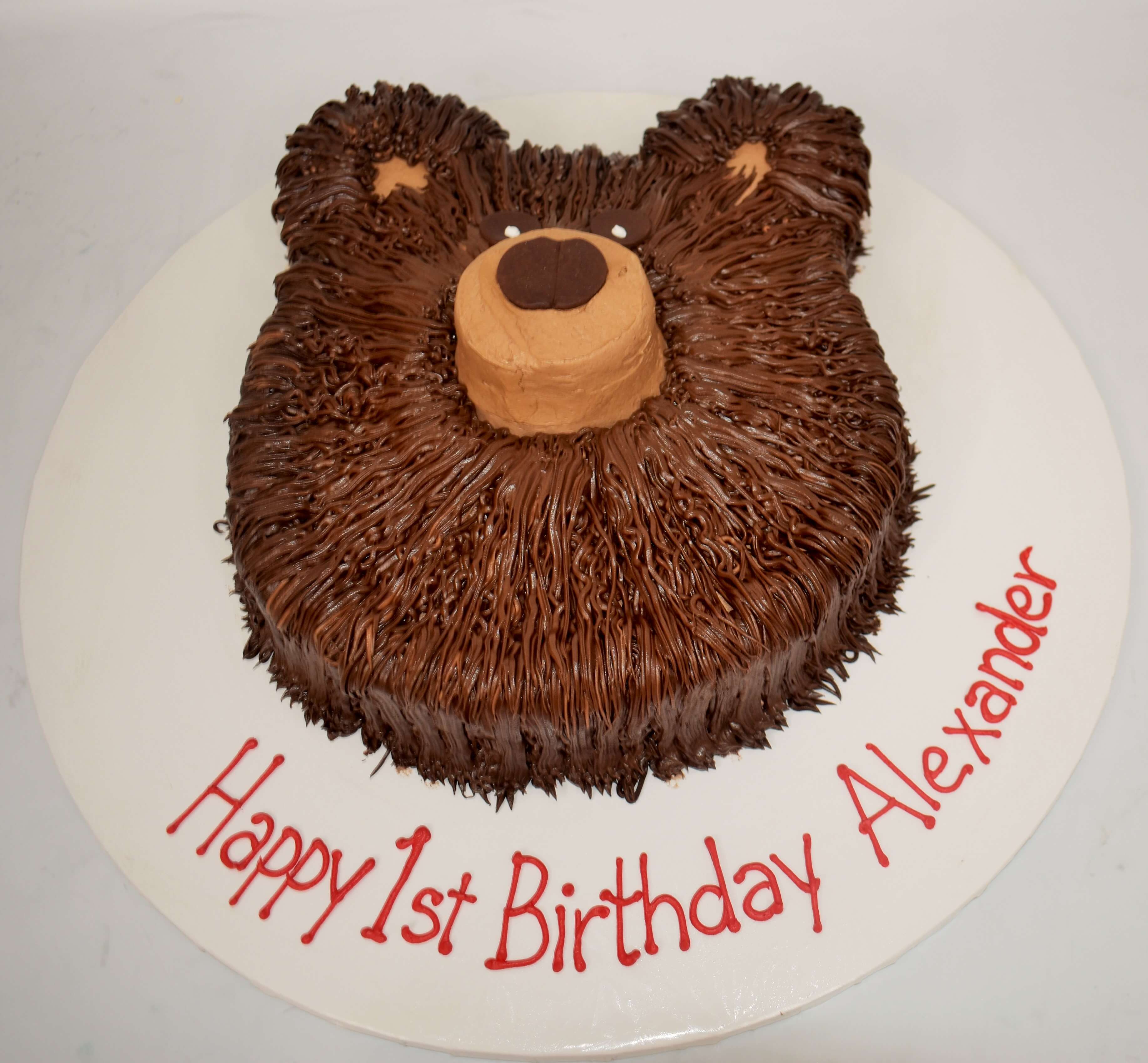 McArthur's Bakery Custom Cake with a Bear Face Cut Out