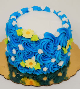 MaArthur's Bakery Custom Cake With Blue Rosettes, Yellow and White Flowers