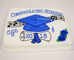 McArthur's Bakery Custom Cake with Large Blue Graduation Hat, Scroll and Music Notes