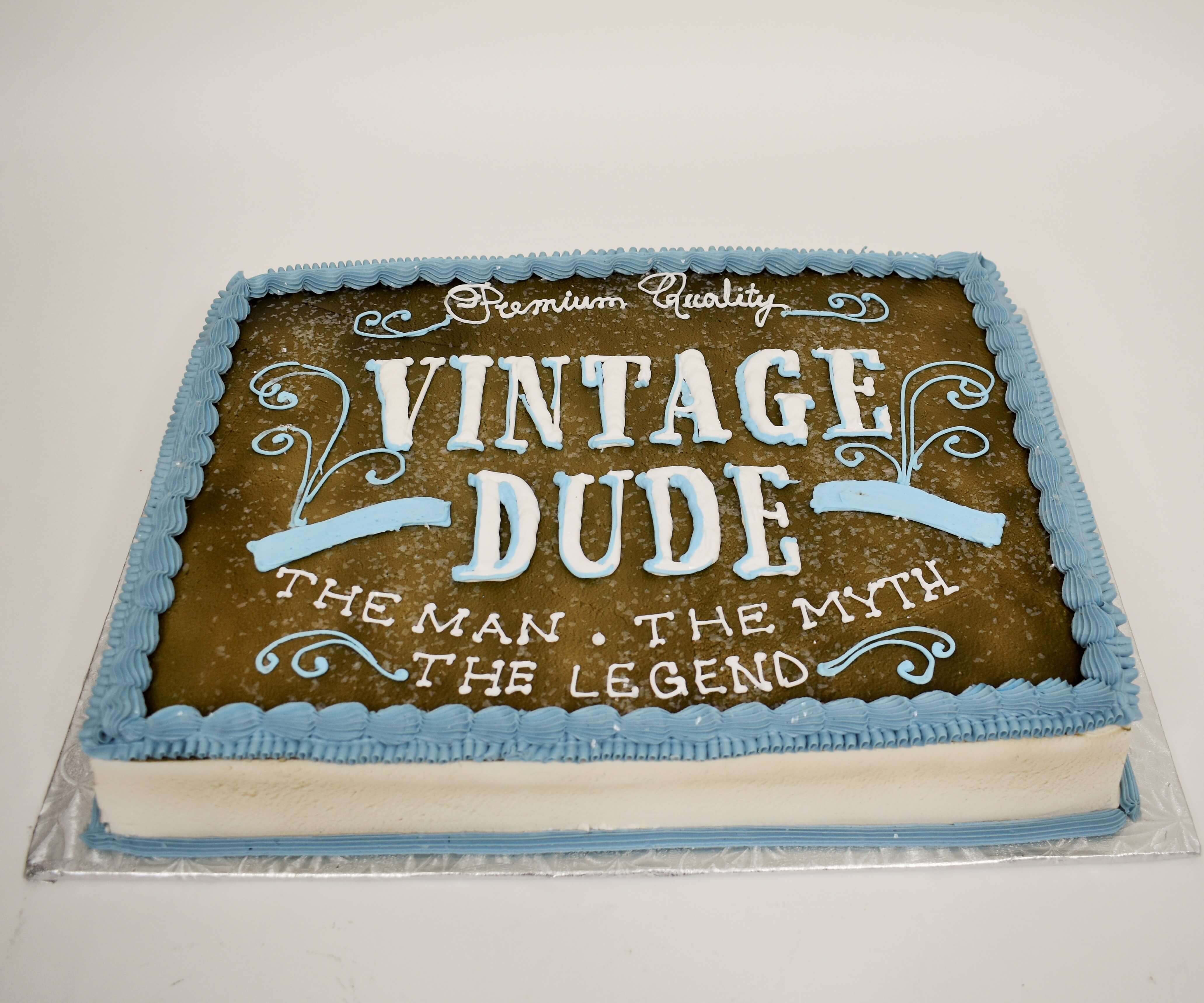 McArthur's Bakery Custom Cake With The Man, The Myth, The Legend Slogan