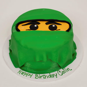 McArthur's Bakery Custom Cake with Yellow Face, Green Overlay