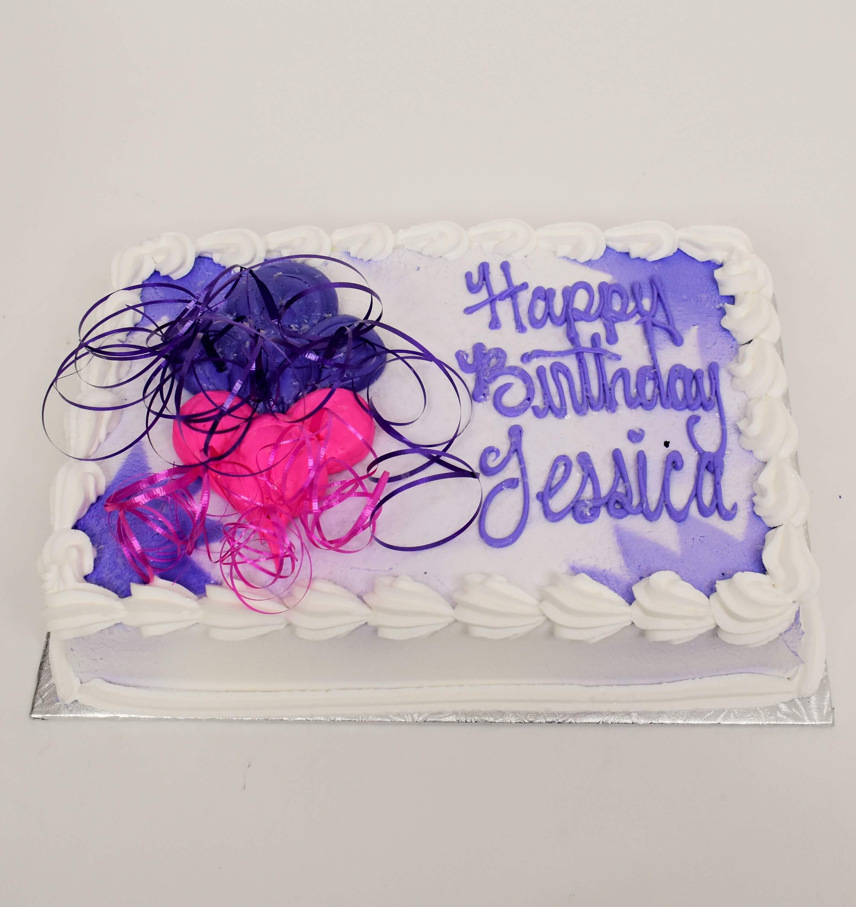 McArthur's Bakery Custom Cake With Vibrant Purple And Pink Balloons