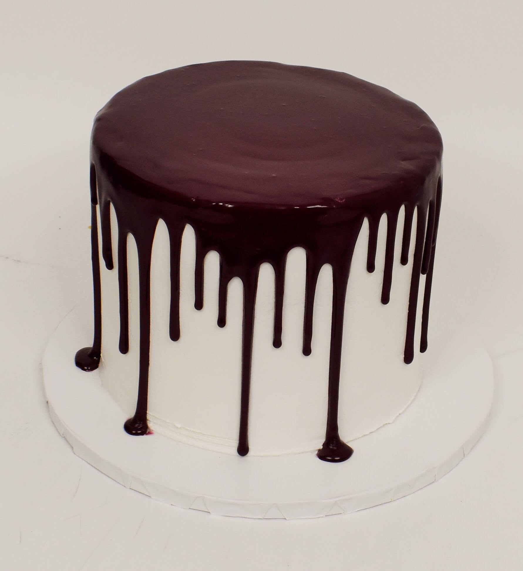 McArthur's Bakery Custom Cake With Chocolate Icing Dripping Down Cake