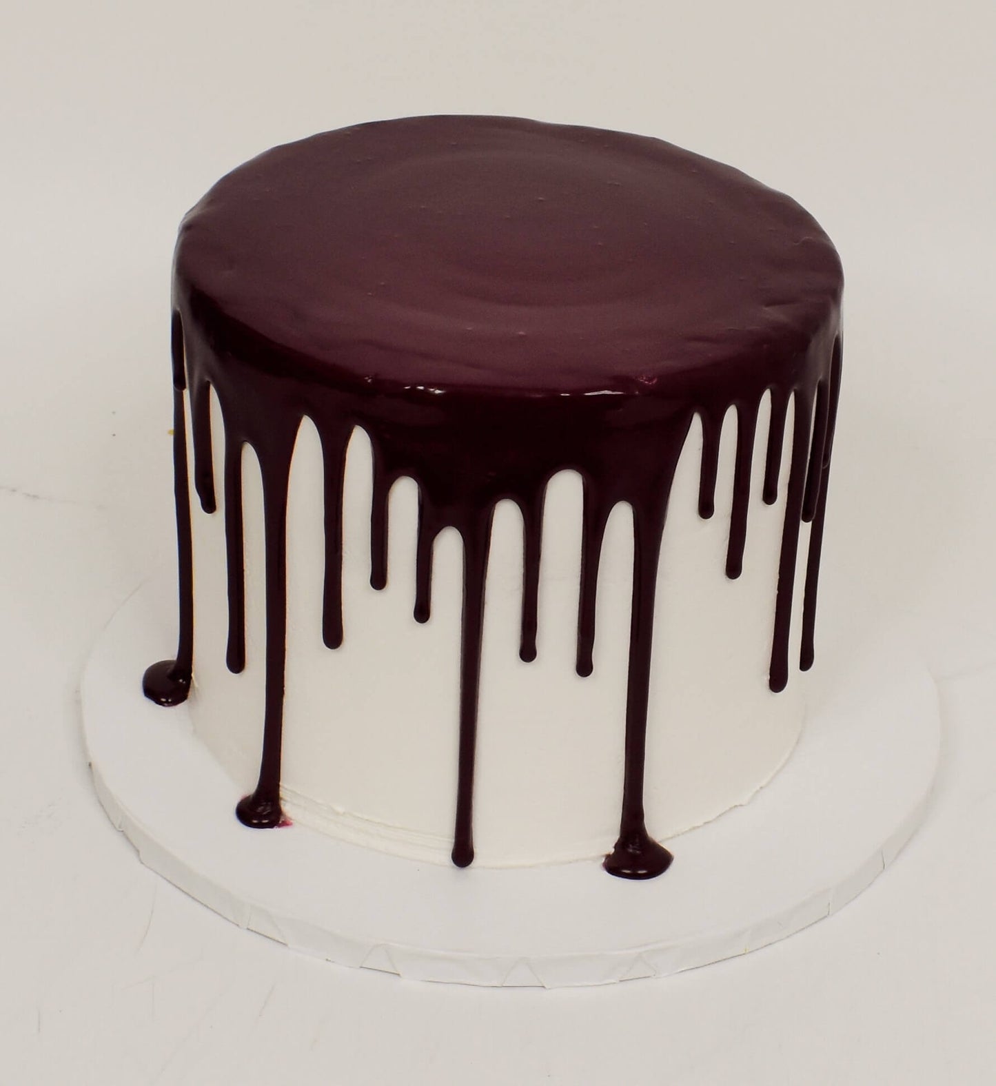 McArthur's Bakery Custom Cake With Chocolate Icing Dripping Down Cake