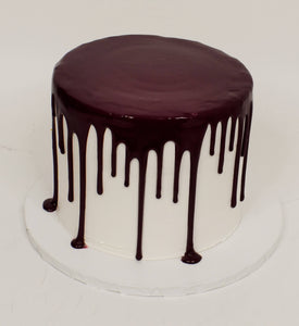 McArthur's Bakery Custom Cake With Chocolate Icing Dripping Down Cake