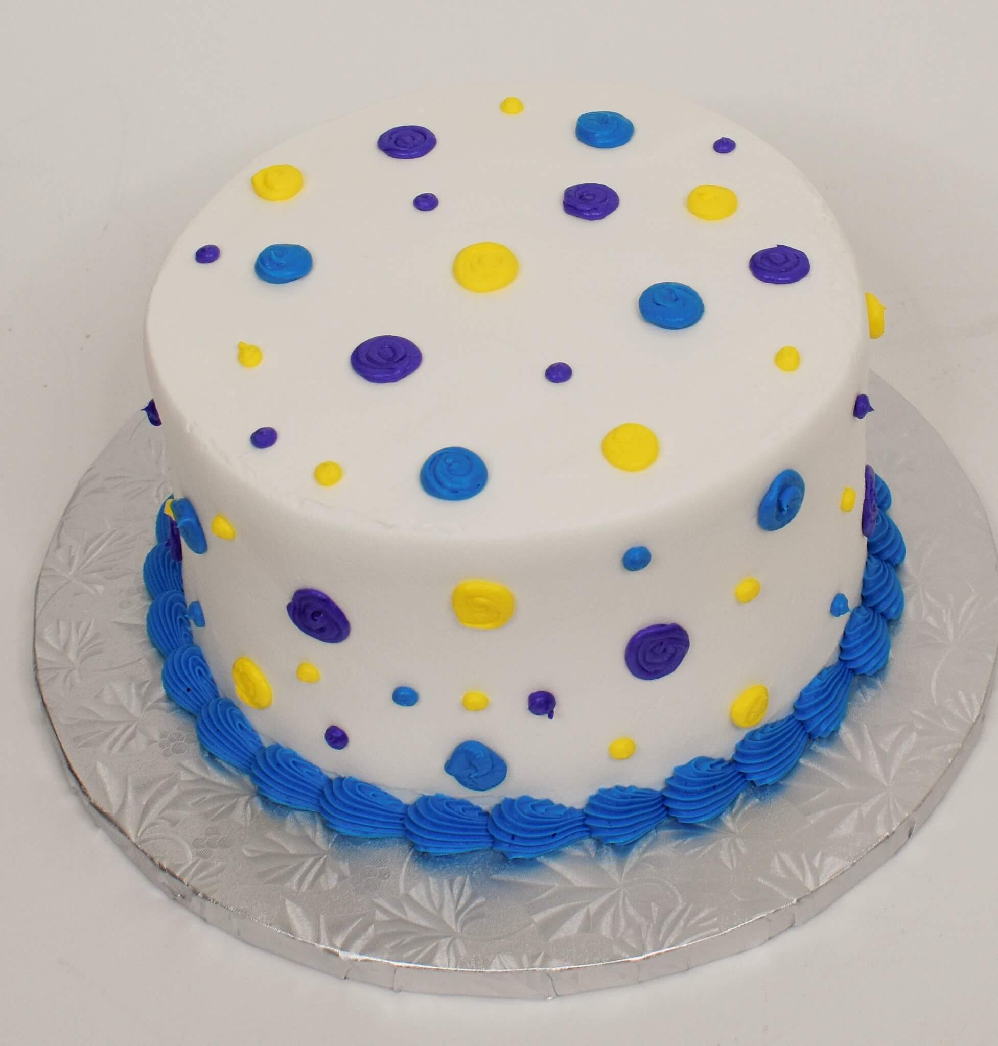 McArthur's Bakery Custom Cake With Yellow, Blue, And Purple Polka Dots