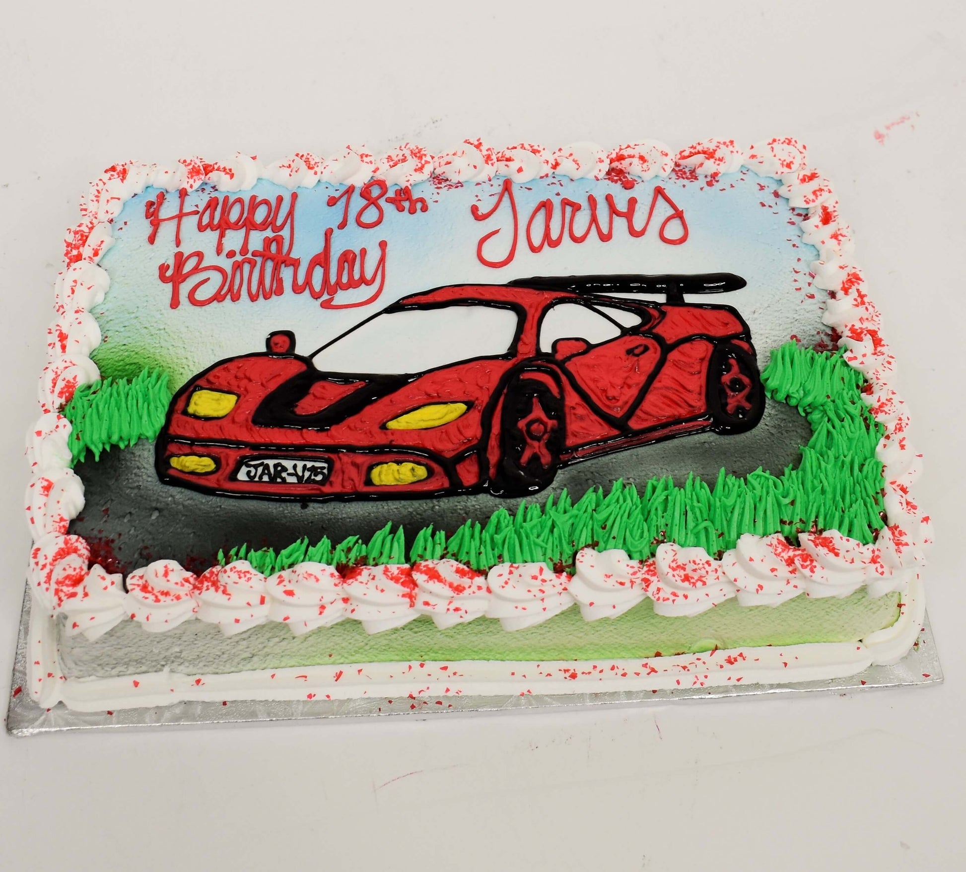 McArthur's Bakery Custom Cake with Red Lamboghini Sitting In Grass