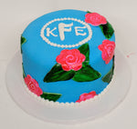 McArthur's Bakery Custom Cake With Monogram Initials And Roses On Blue