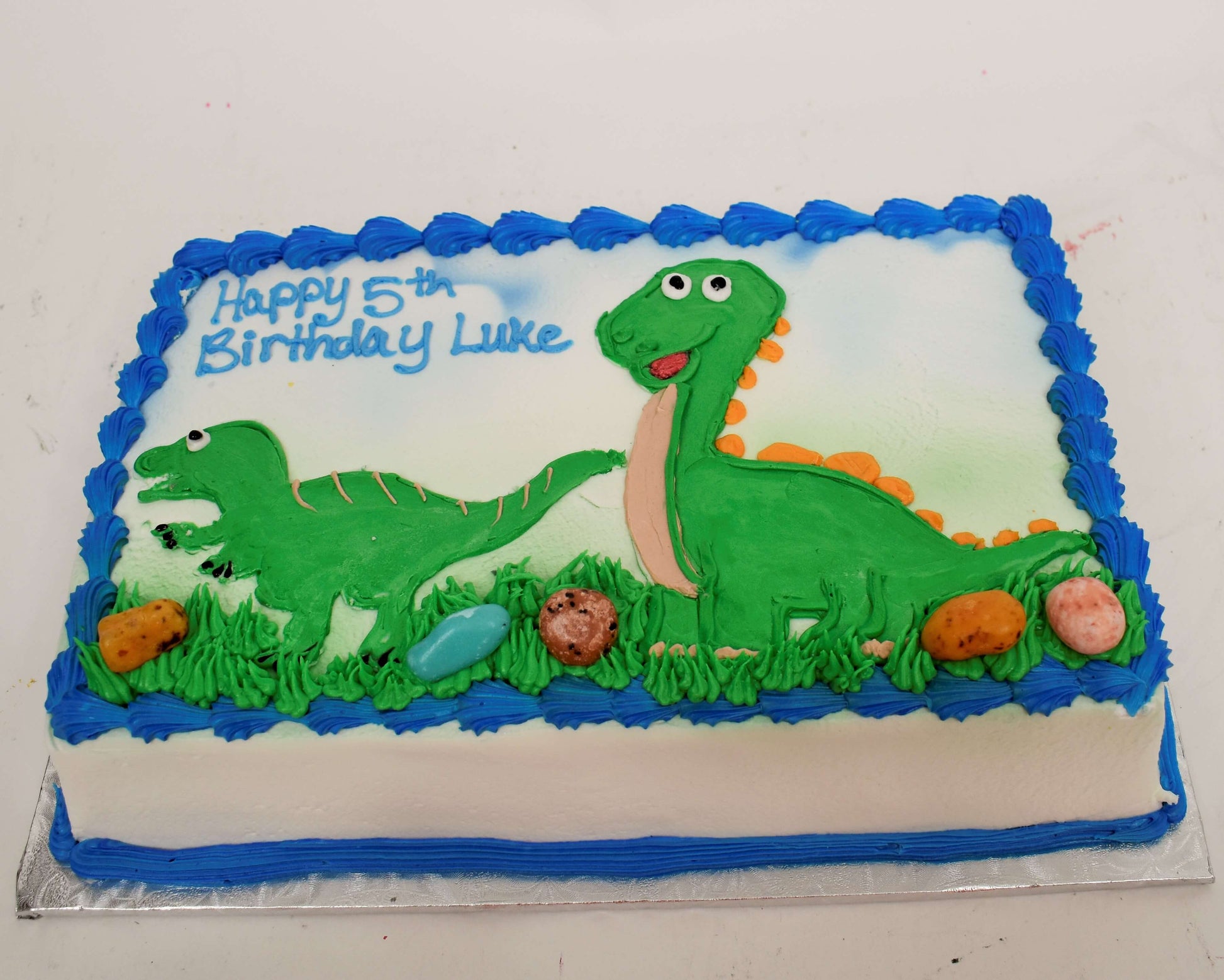 McArthur's Bakery Custom Cake With Dinosaurs Playing