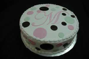 MaArthur's Bakery Custom Cake with Initial and Fondant Dots