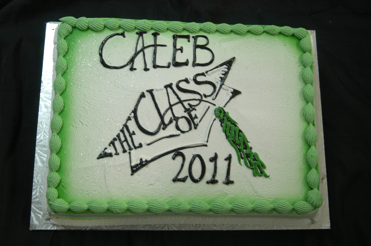 MaArthur's Bakery Custom Cake with Green background, Graduation Cap and Tassel