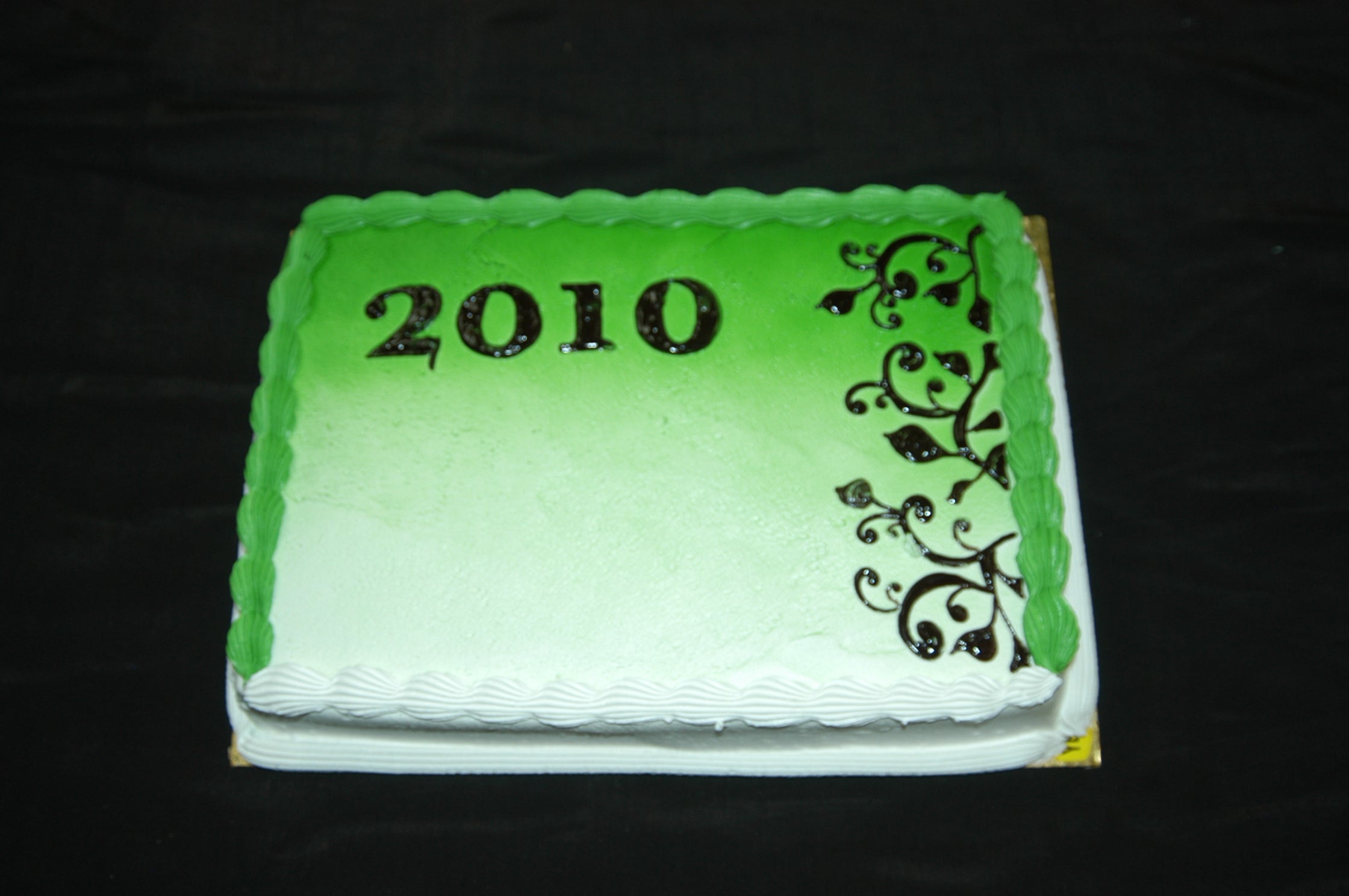 MaArthur's Bakery Custom Cake with Green Background and Black Ivy